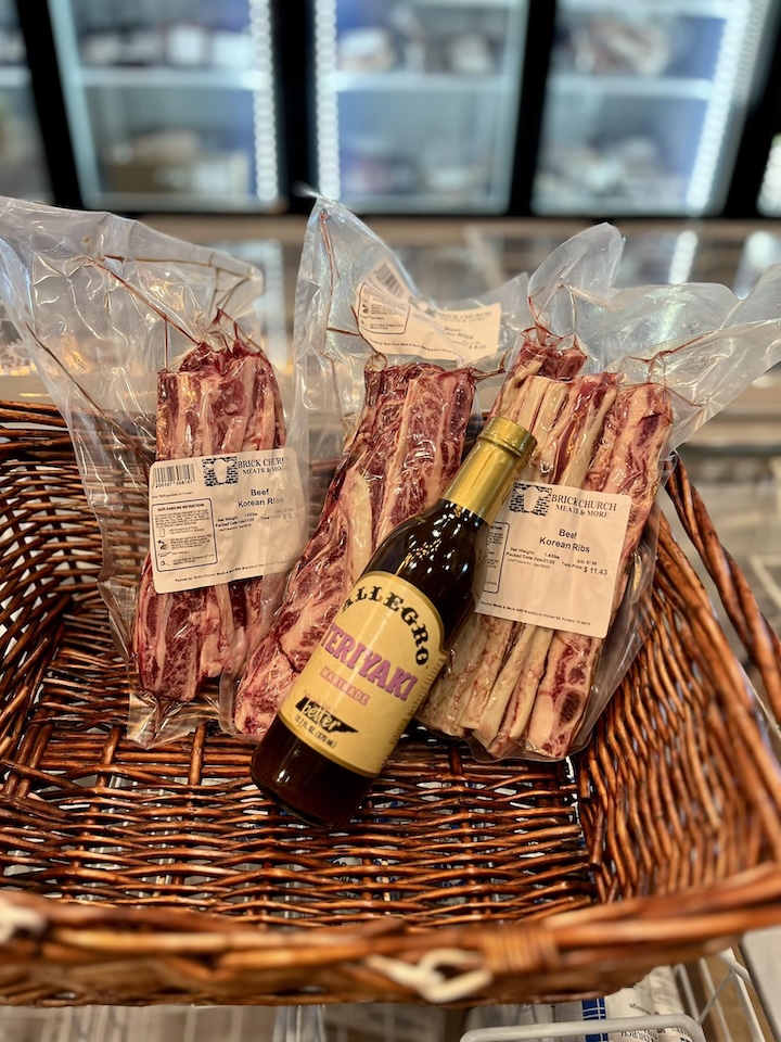 Photo of beeswax taper candles in the gift shop of Brick Church Meats & More