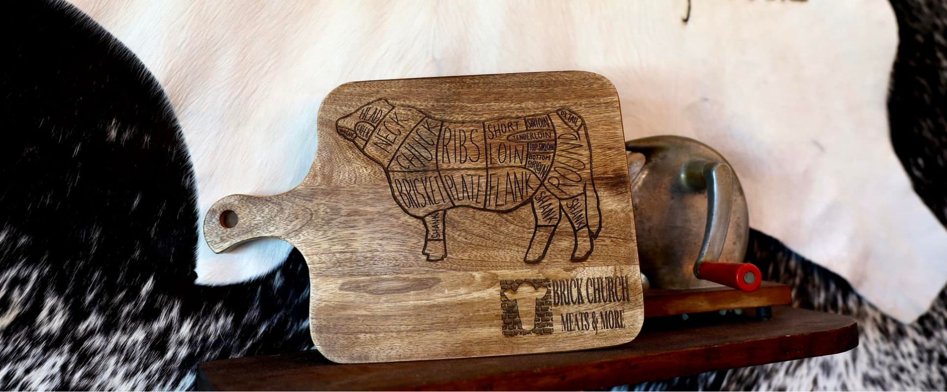 Photo of cutting board from Brick Church Meats and More showing cuts of beef