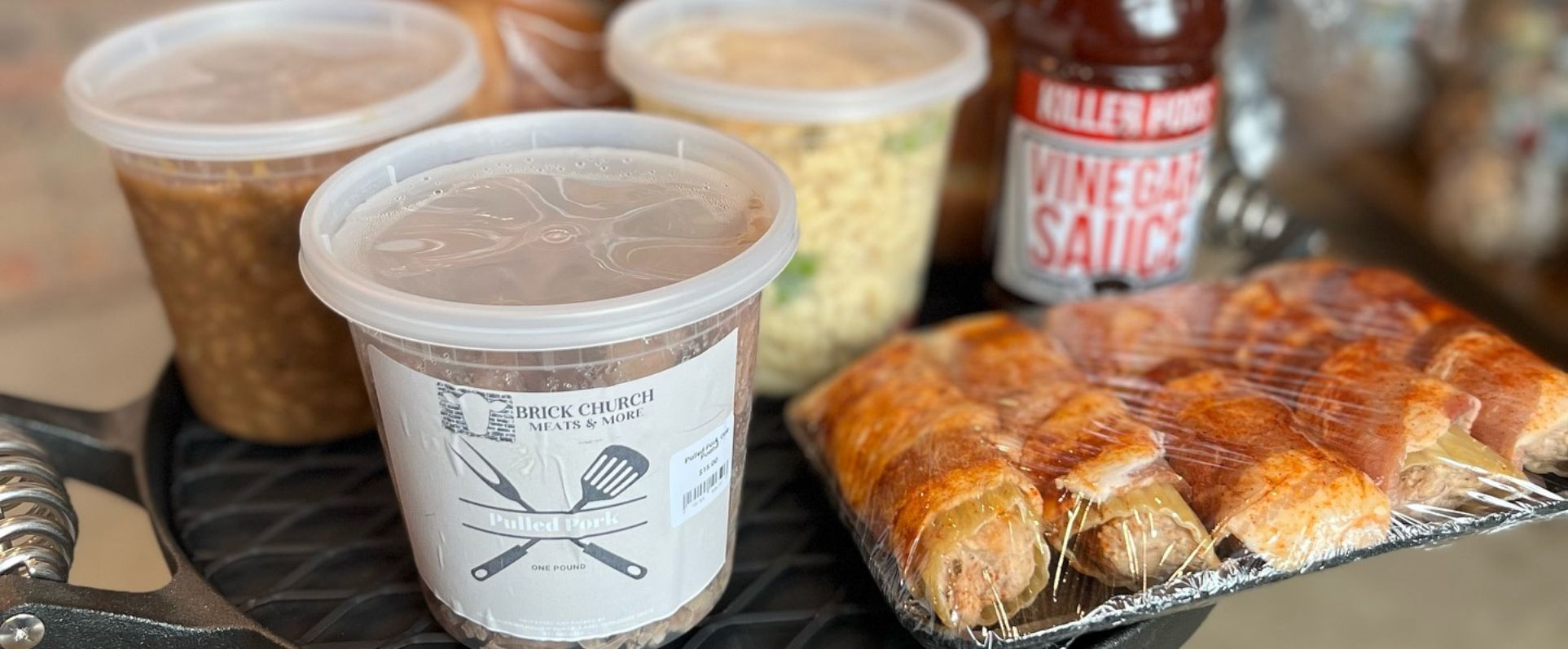 Photo of ready to eat foods packaged to go from the Brick Church Meats and More store